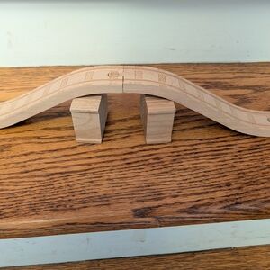 Elegant Curved Wooden Bridge Accent